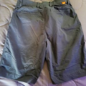 Nike Cargo long shorts... Work pant material. Very nice. NIKE shorts long. Blue.